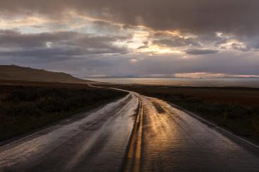 After the Storm - Dave Perkins Photography www_dperkinsphoto_com Wet road just before sunset on Antelope Island, after a storm_ _road _rain _nature.jpg